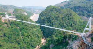 Be thrilled by the world’s longest glass-bottomed bridge